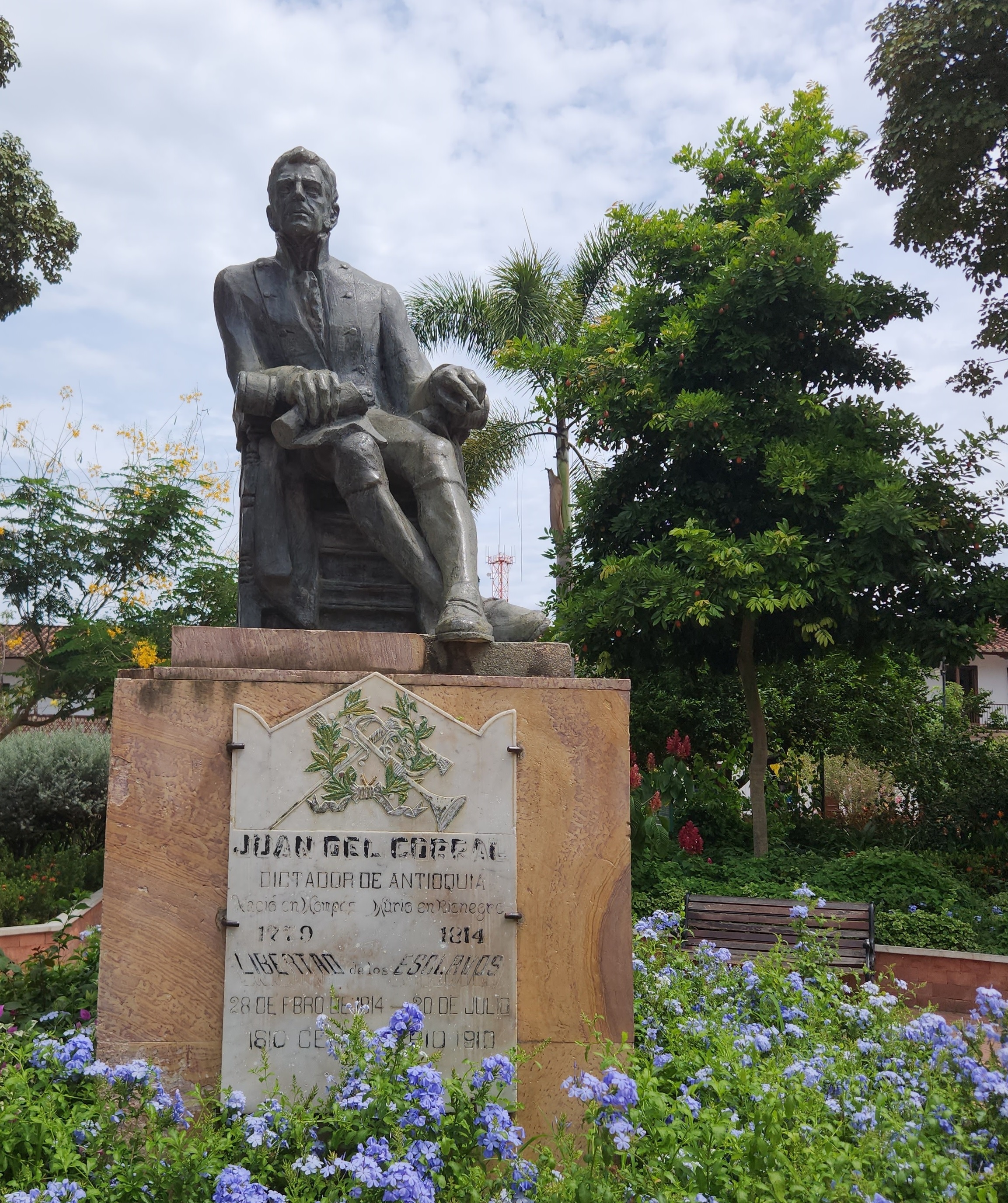 Orange typewriter on a wooden table close-up