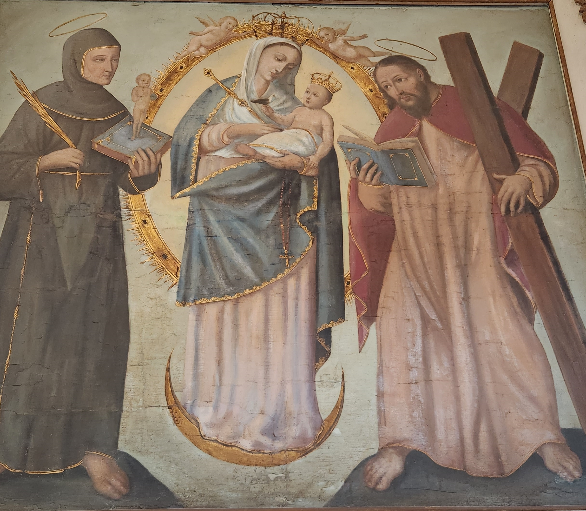 Orange typewriter on a wooden table close-up