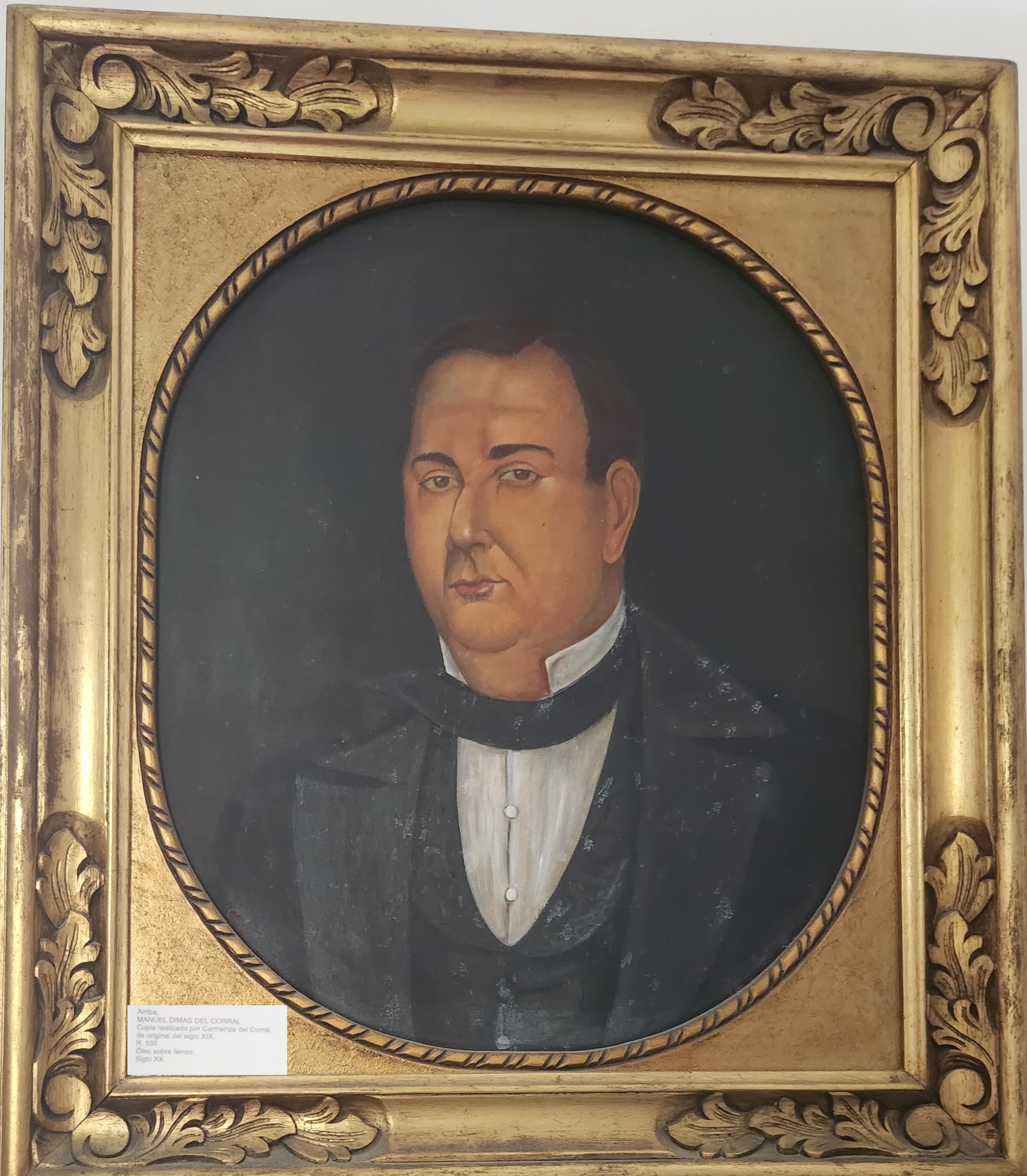 Orange typewriter on a wooden table close-up