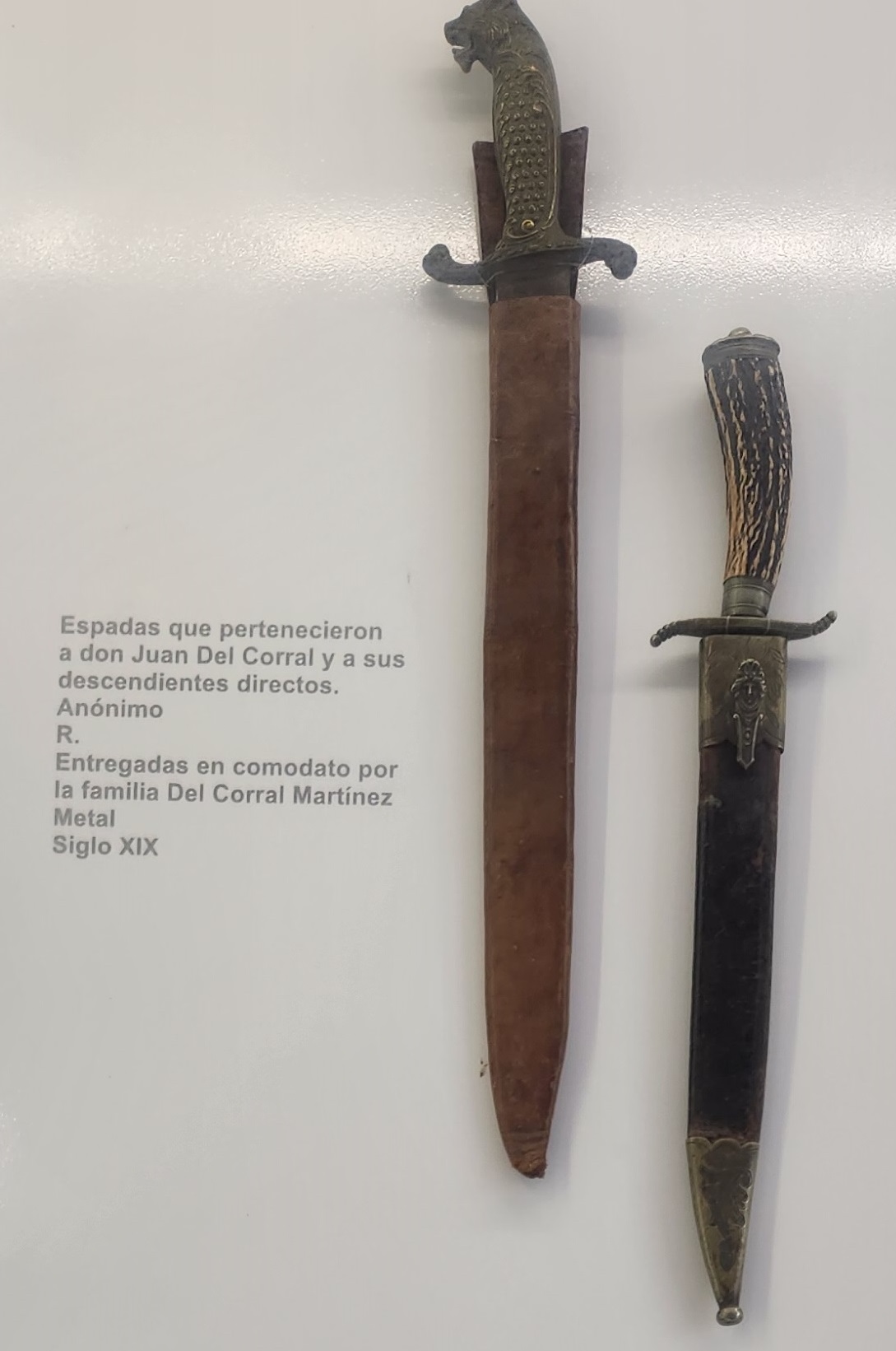 Orange typewriter on a wooden table close-up
