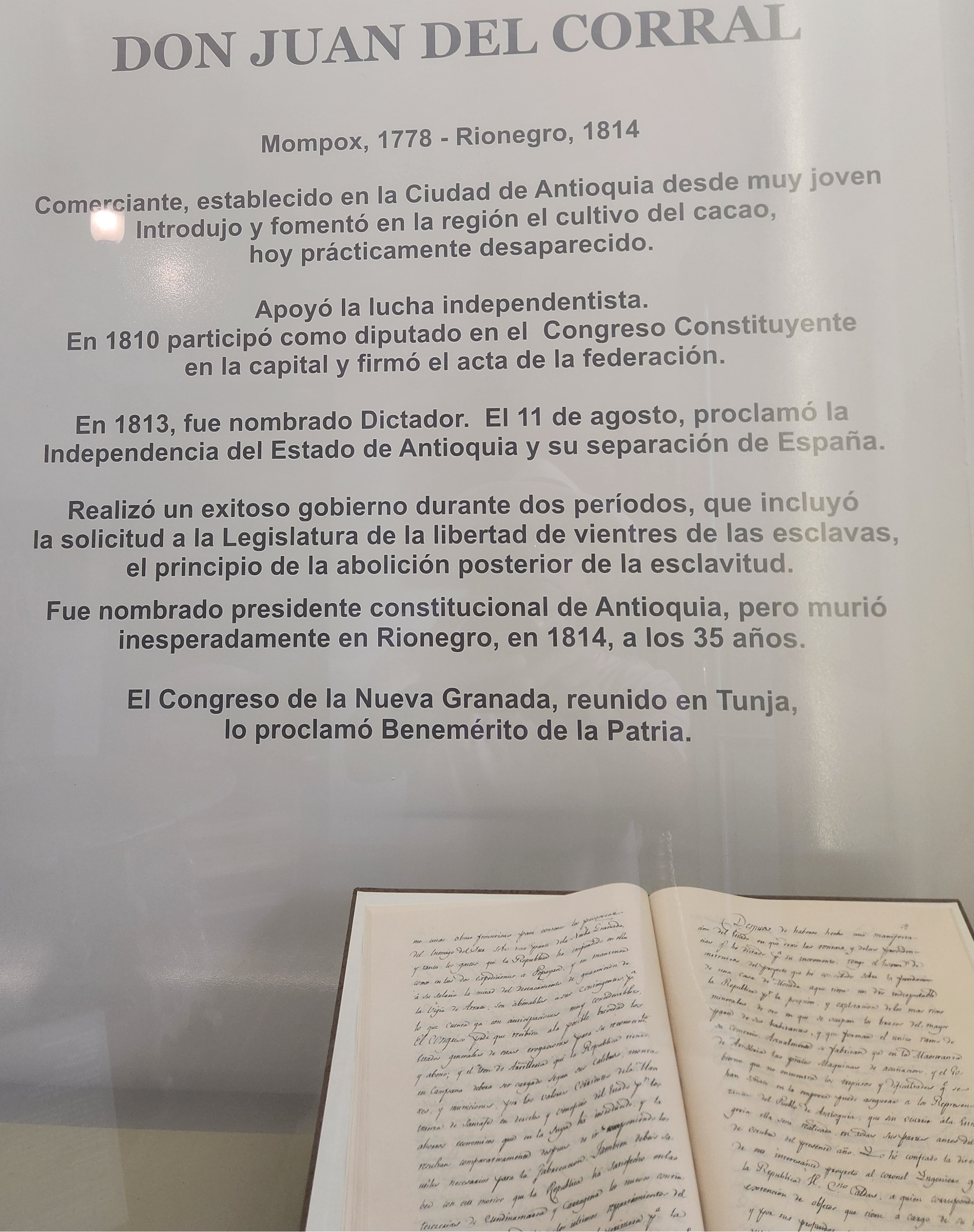 Orange typewriter on a wooden table close-up