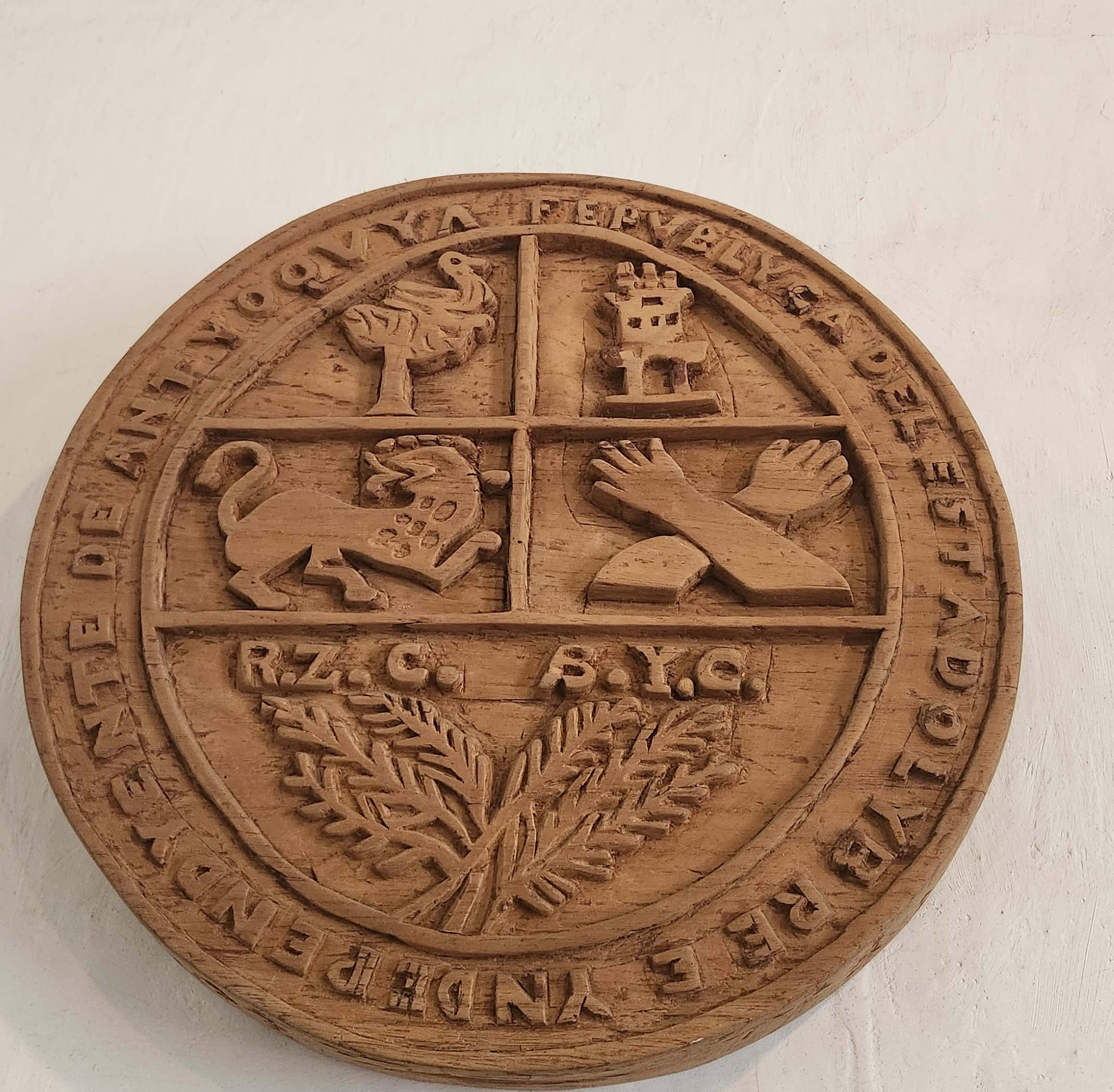 Orange typewriter on a wooden table close-up