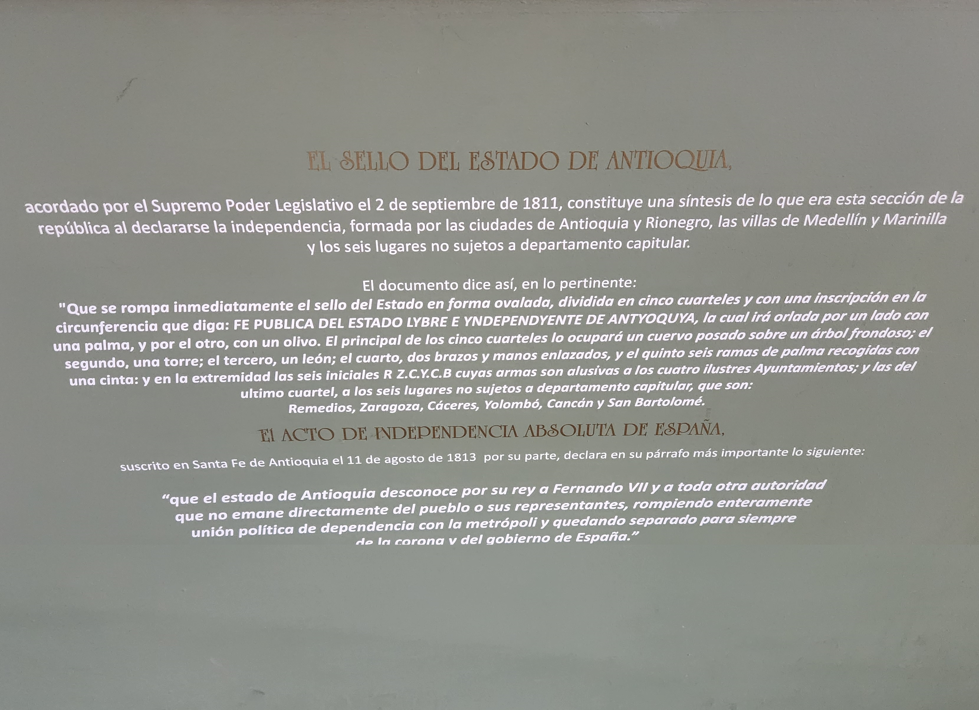 Orange typewriter on a wooden table close-up