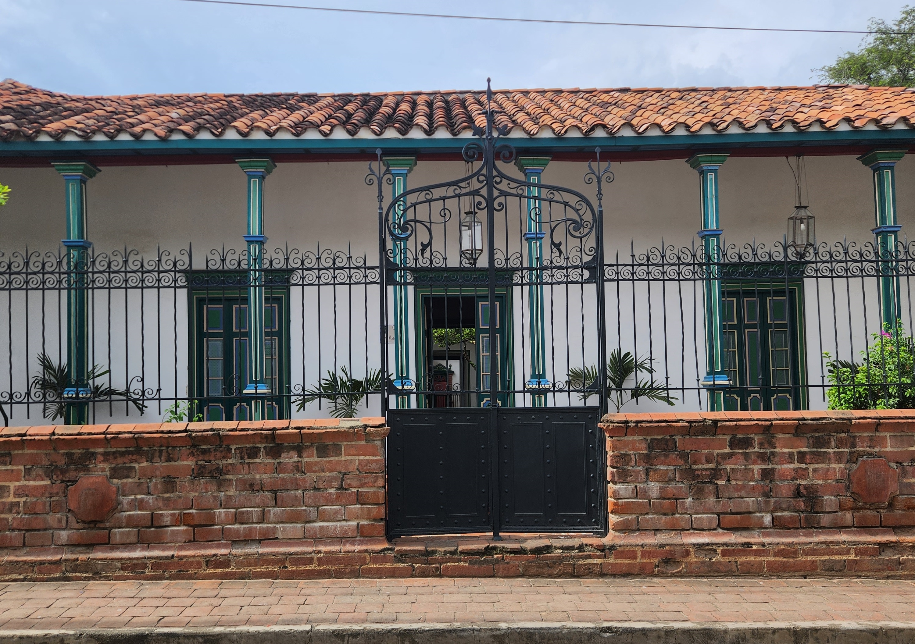 Orange typewriter on a wooden table close-up