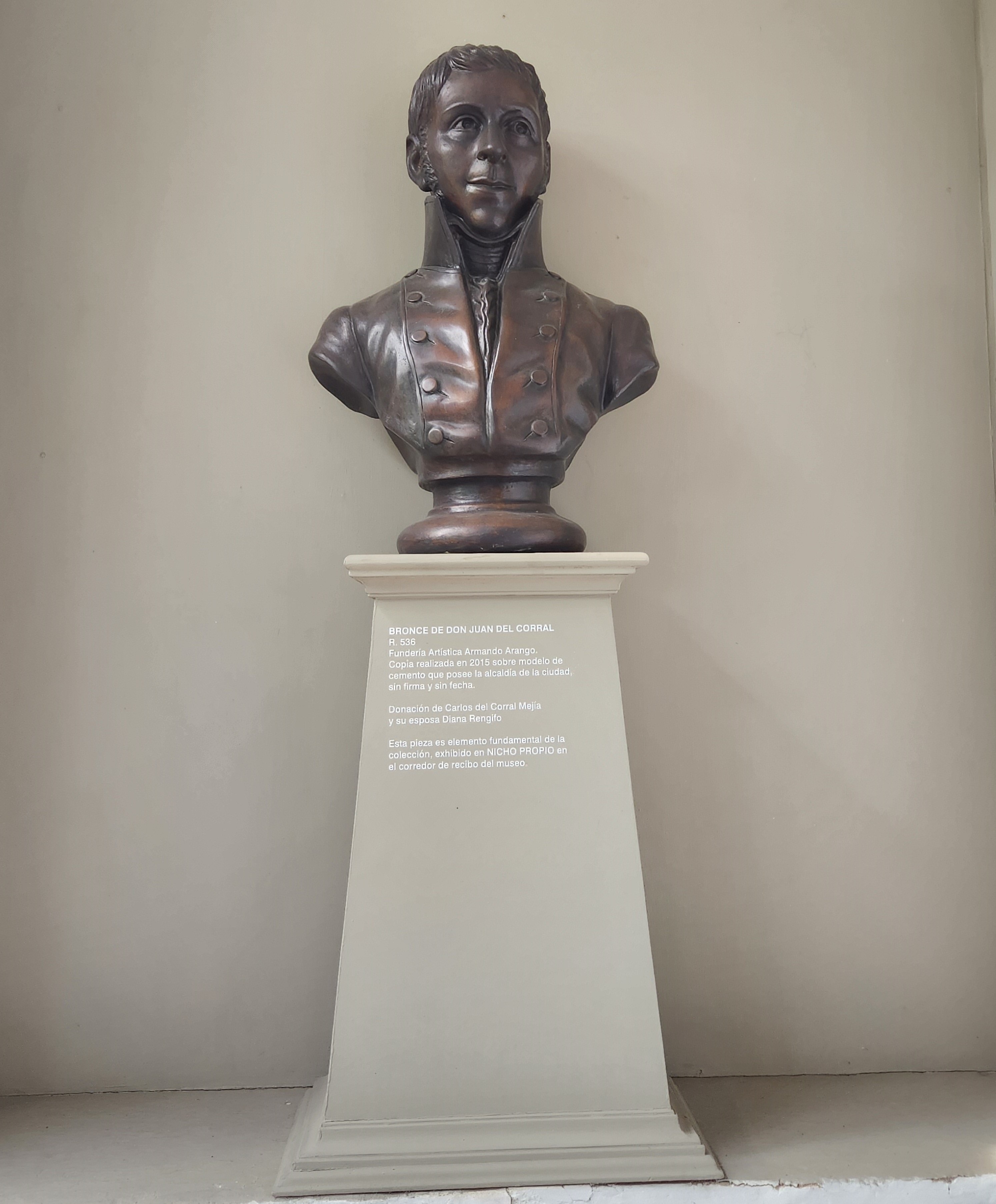 Orange typewriter on a wooden table close-up