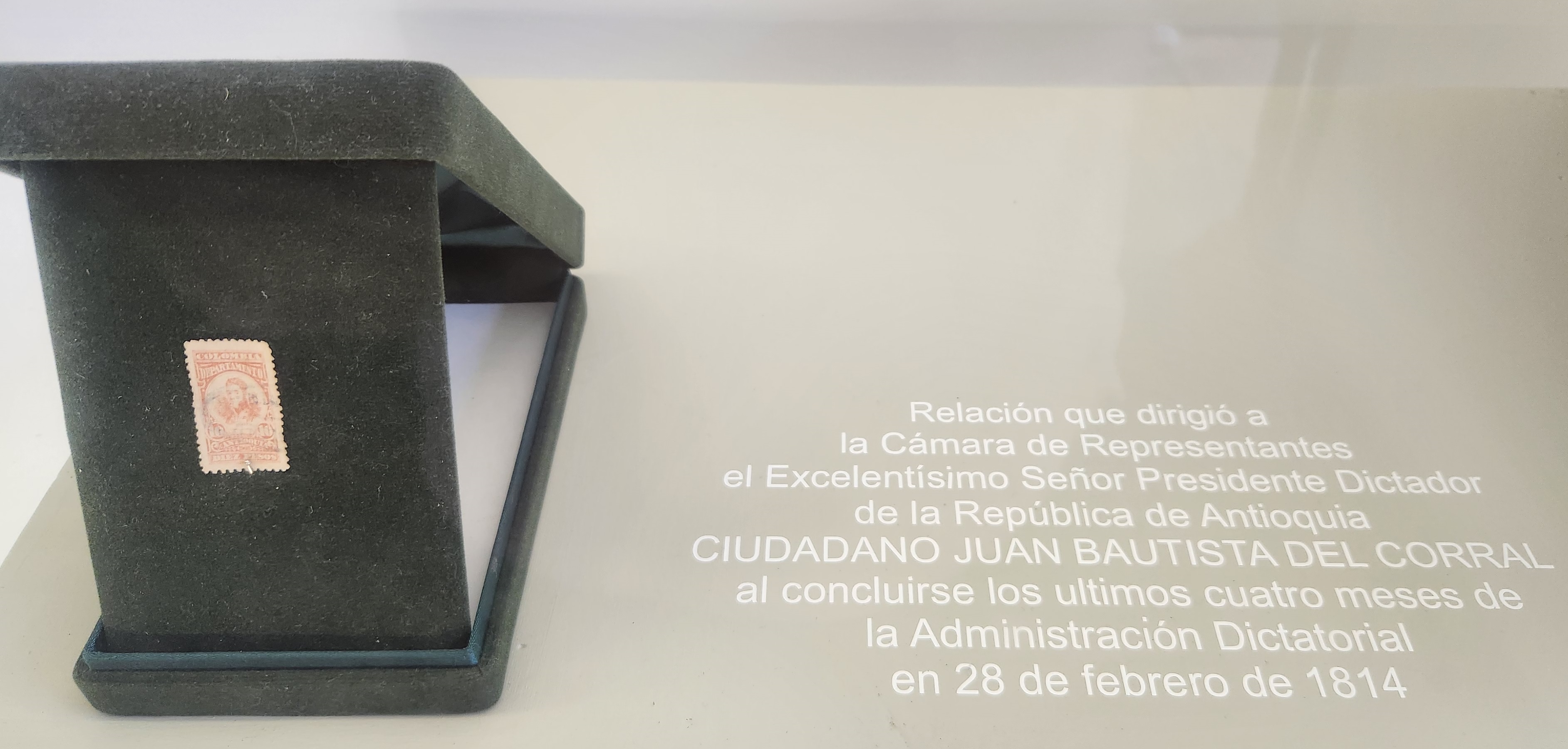 Orange typewriter on a wooden table close-up