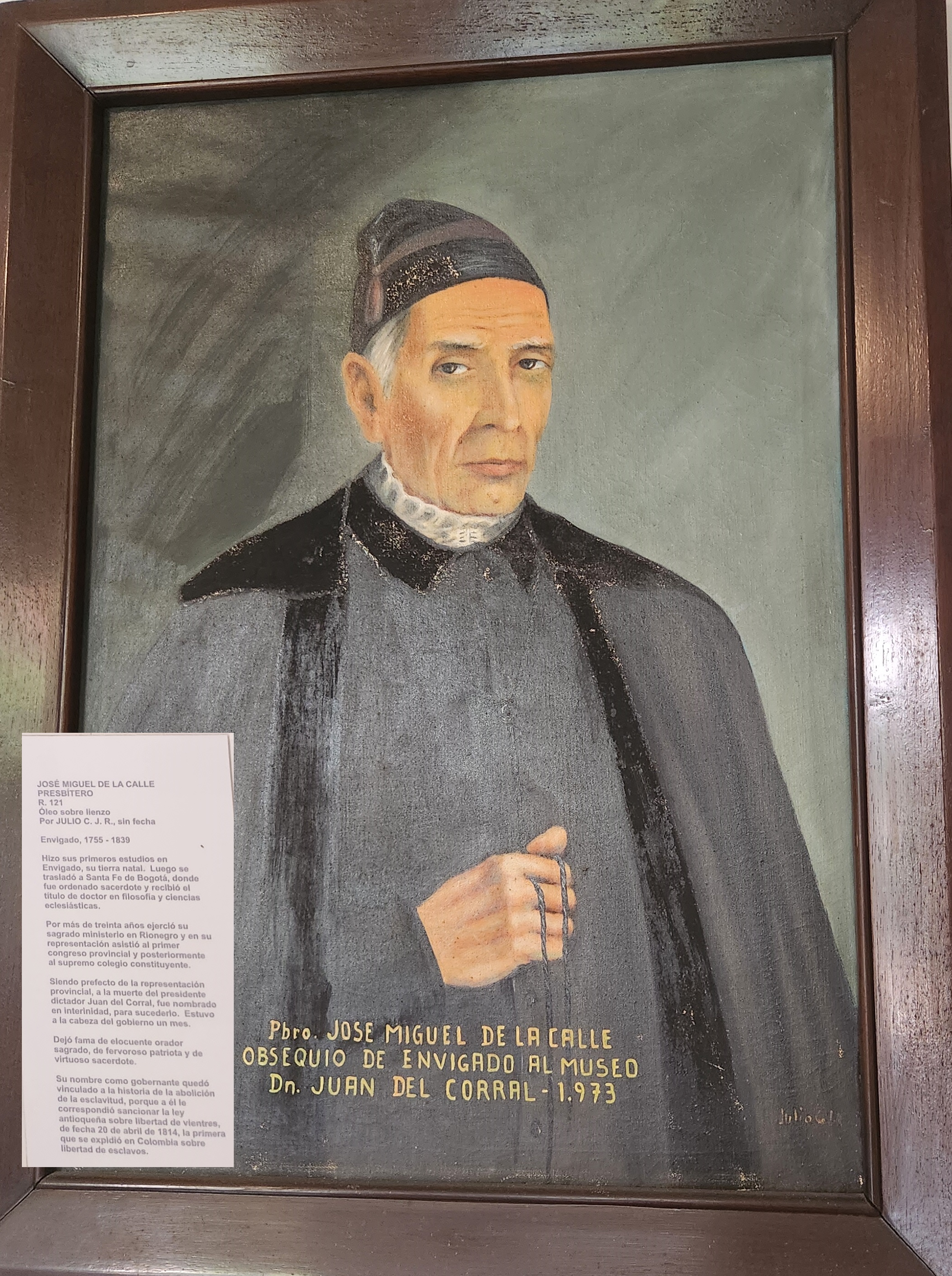 Orange typewriter on a wooden table close-up
